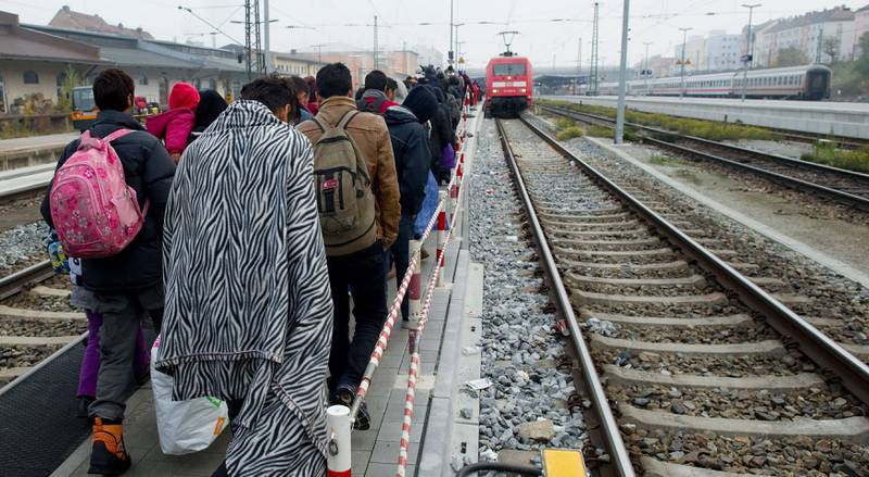 Flyktningene frykter døra til Tyskland skal stenges. Mange forsøker farefulle måter å komme seg inn i landet på. FOTO: NTB SCANPIX