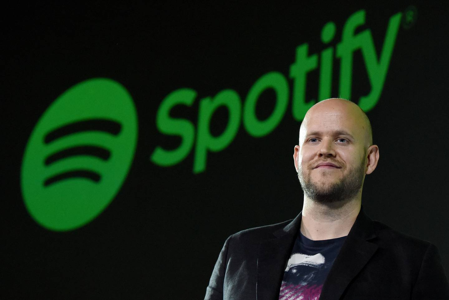 Daniel Ek, CEO of Swedish music streaming service Spotify, poses for photographers at a press conference in Tokyo on September 29, 2016. 
Spotify kicked off its services in Japan on Sept