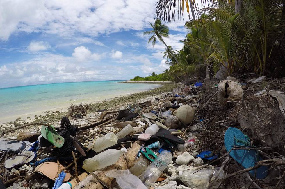 This handout photo released by the University of Tasmania shows debris on a beach on Cocos Islands. - The world may be seriously underestimating the amount of plastic waste along its coastlines, researchers said on May 16, 2019 as they unveiled findings showing hundreds of millions of plastic fragments on a remote Indian Ocean archipelago. (Photo by Silke Struckenbrock / UNIVERSITY OF TASMANIA / AFP) / RESTRICTED TO EDITORIAL USE - MANDATORY CREDIT "AFP PHOTO / UNIVERSITY OF TASMANIA/ SILKE STRUCKENBROCK " - NO MARKETING NO ADVERTISING CAMPAIGNS - DISTRIBUTED AS A SERVICE TO CLIENTS