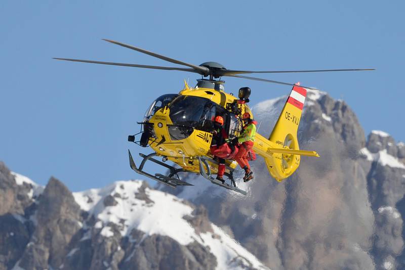 Medical helicopter lifts injured Norway's Kajsa Vickhoff Lie after she fell during an alpine ski, women's World Cup super G, in Val di Fassa, Italy, Sunday, Feb. 28, 2021. (AP Photo/Elvis Piazza)