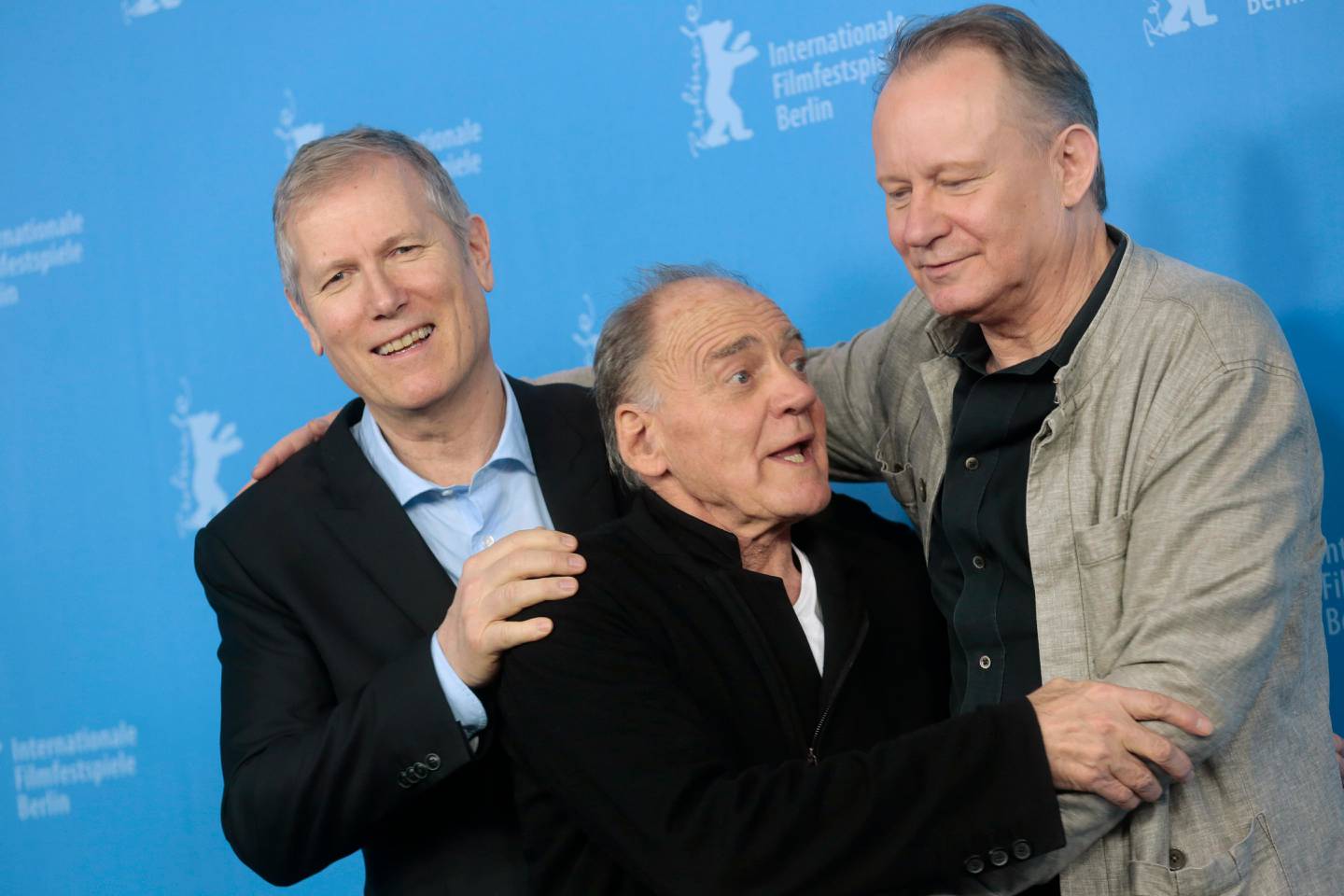 From left, director Hans Petter Moland, actors Bruno Ganz and actor Stellan Skarsgard pose for photographers at the photo call for the film In Order of Disappearance during the International Film Festival Berlinale in Berlin, Monday, Feb. 10, 2014. (AP Photo/Markus Schreiber)