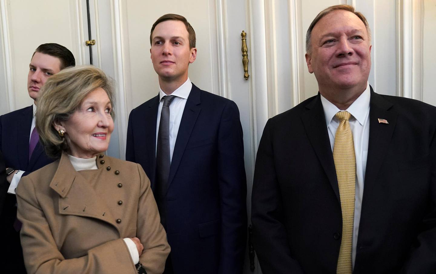 U.S. Ambassador to NATO Kay Bailey Hutchison looks at U.S. Secretary of State Mike Pompeo next to White House senior advisor Jared Kushner during the meeting of U.S. President Donald Trump and NATO Secretary General Jens Stoltenberg, ahead of the NATO summit in Watford, in London, Britain, December 3, 2019. REUTERS/Kevin Lamarque