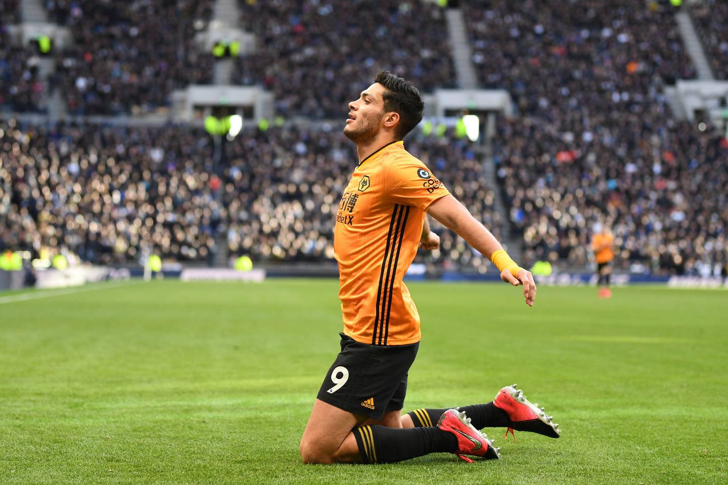 Wolverhampton Wanderers' Mexican striker Raul Jimenez celebrates after scoring their third goal during the English Premier League football match between Tottenham Hotspur and Wolverhampton Wanderers at the Tottenham Hotspur Stadium in London, on March 1, 2020. (Photo by DANIEL LEAL-OLIVAS / AFP) / RESTRICTED TO EDITORIAL USE. No use with unauthorized audio, video, data, fixture lists, club/league logos or 'live' services. Online in-match use limited to 120 images. An additional 40 images may be used in extra time. No video emulation. Social media in-match use limited to 120 images. An additional 40 images may be used in extra time. No use in betting publications, games or single club/league/player publications. / 