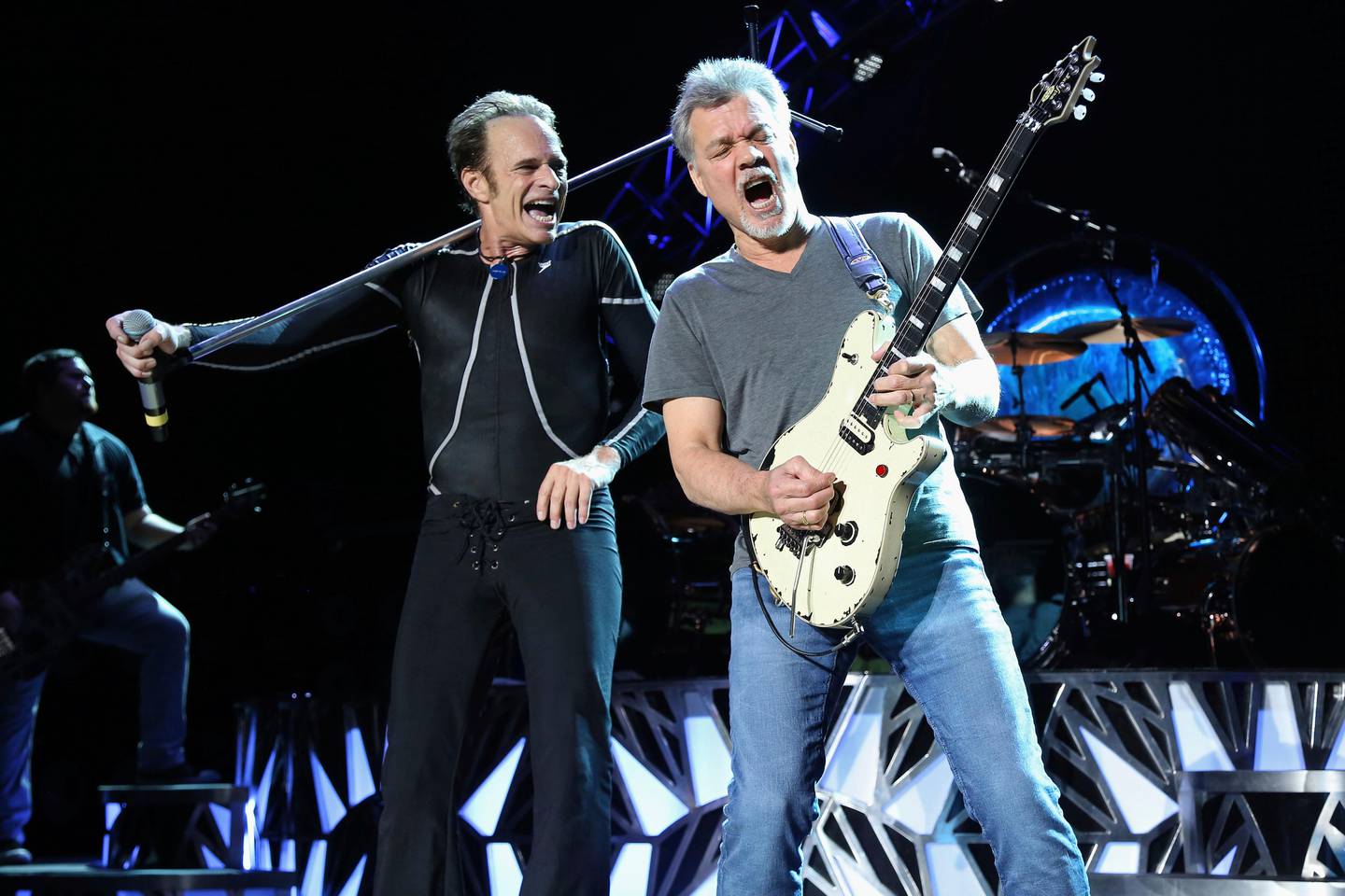 FILE - David Lee Roth, left, and Eddie Van Halen of Van Halen perform in Wantagh, N.Y. on Aug. 13, 2015. Van Halen, who had battled cancer, died Tuesday, Oct. 6, 2020. He was 65. (Photo by Greg Allen/Invision/AP, File)