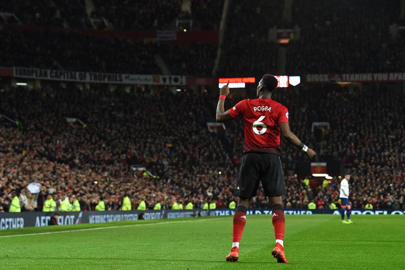 TOPSHOT - Manchester United's French midfielder Paul Pogba celebrates after scoring their second goal during the English Premier League football match between Manchester United and Bournemouth at Old Trafford in Manchester, north west England, on December 30, 2018. (Photo by Paul ELLIS / AFP) / RESTRICTED TO EDITORIAL USE. No use with unauthorized audio, video, data, fixture lists, club/league logos or 'live' services. Online in-match use limited to 120 images. An additional 40 images may be used in extra time. No video emulation. Social media in-match use limited to 120 images. An additional 40 images may be used in extra time. No use in betting publications, games or single club/league/player publications. / 