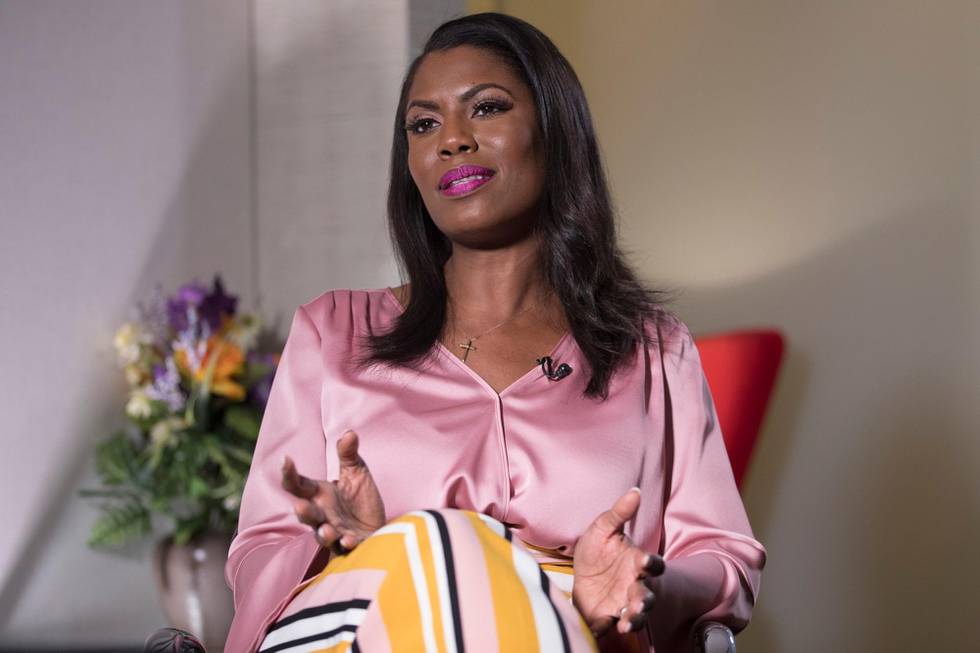 Former White House staffer Omarosa Manigault Newman speaks during an interview with The Associated Press, Tuesday, Aug. 14, 2018, in New York. Manigault Newman declared she ‚Äúwill not be silenced‚Äù by President Donald Trump, remaining defiant as her public feud with her former boss shifted from a war of words to a possible legal battle. (AP Photo/Mary Altaffer)
