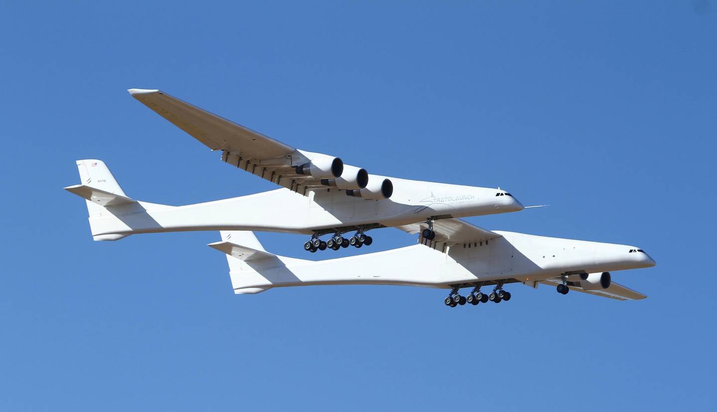 Stratolaunch, a giant six-engine aircraft with the worldÄôs longest wingspan , makes its historic first flight from the Mojave Air and Space Port in Mojave, Calif., Saturday, April 13, 2019. Founded by the late billionaire Paul G. Allen, Stratolaunch is vying to be a contender in the market for air-launching small satellites.  (AP Photo/Matt Hartman)