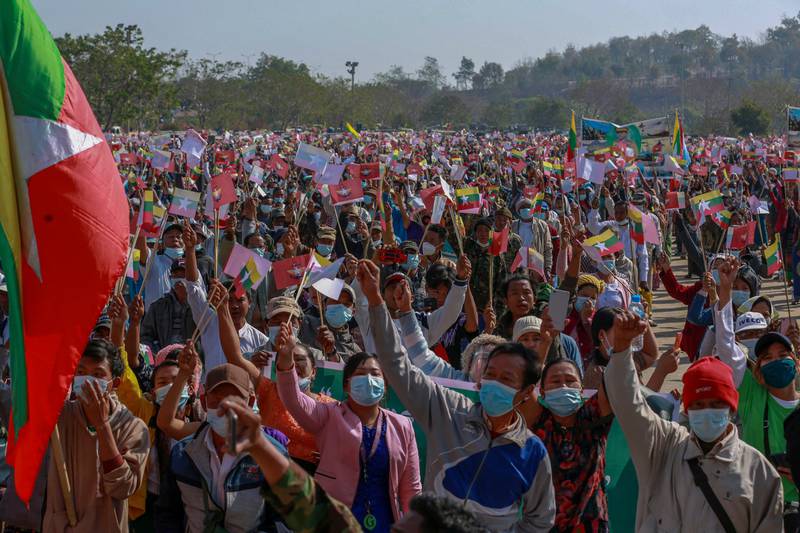 Supporters of Myanmar military wave Myanmar national flags during a rally supporting military coup in Naypyitaw, Myanmar, Thursday, Feb. 4, 2021. Myanmar's new military government has blocked access to Facebook as resistance to Monday's coup surged amid calls for civil disobedience to protest the ousting of the elected civilian government and its leader Aung San Suu Kyi. (AP Photo)
