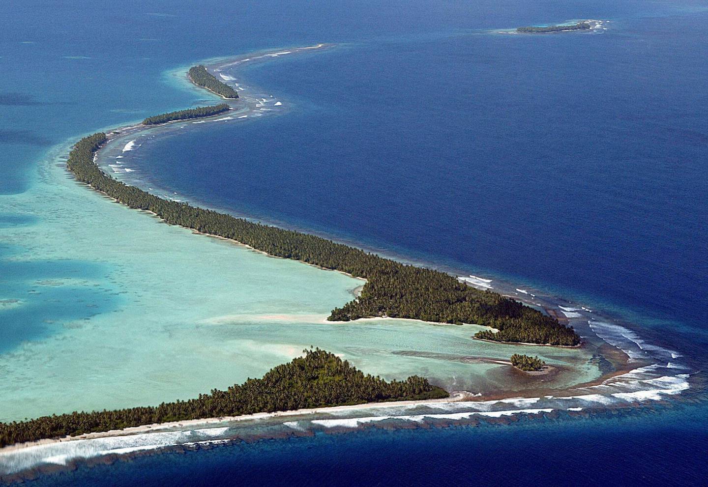 Tuvalu tilhører Marshalløyene i Stillehavet, og vil forsvinne under havoverflaten dersom havet stiger.