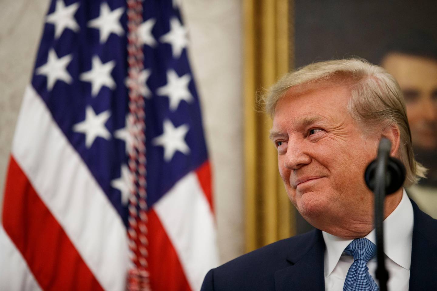 President Donald Trump smiles while speaking during a Presidential Medal of Freedom ceremony for former NBA basketball player and coach Bob Cousy, of the Boston Celtics, in the Oval Office of the White House, Thursday, Aug. 22, 2019, in Washington. (AP Photo/Alex Brandon)