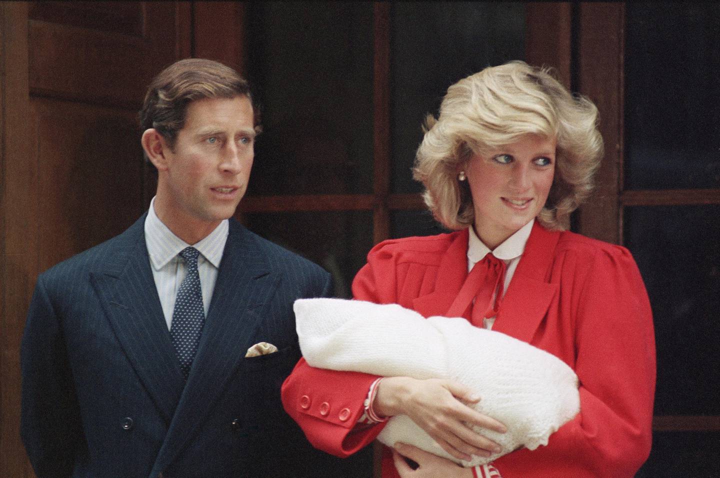FILE - In this Sept. 16, 1984 file photo, Britain's Prince Charles and Princess Diana, leave St. Mary's Hospital in Paddington, London, with their new baby son. Princess Diana carries new baby, Prince Harry who was born on Sept. 15. It has been 20 years since the death of Princess Diana in a car crash in Paris and the outpouring of grief that followed the death of the ÄúpeopleÄôs princess.Äù (AP Photo, File)