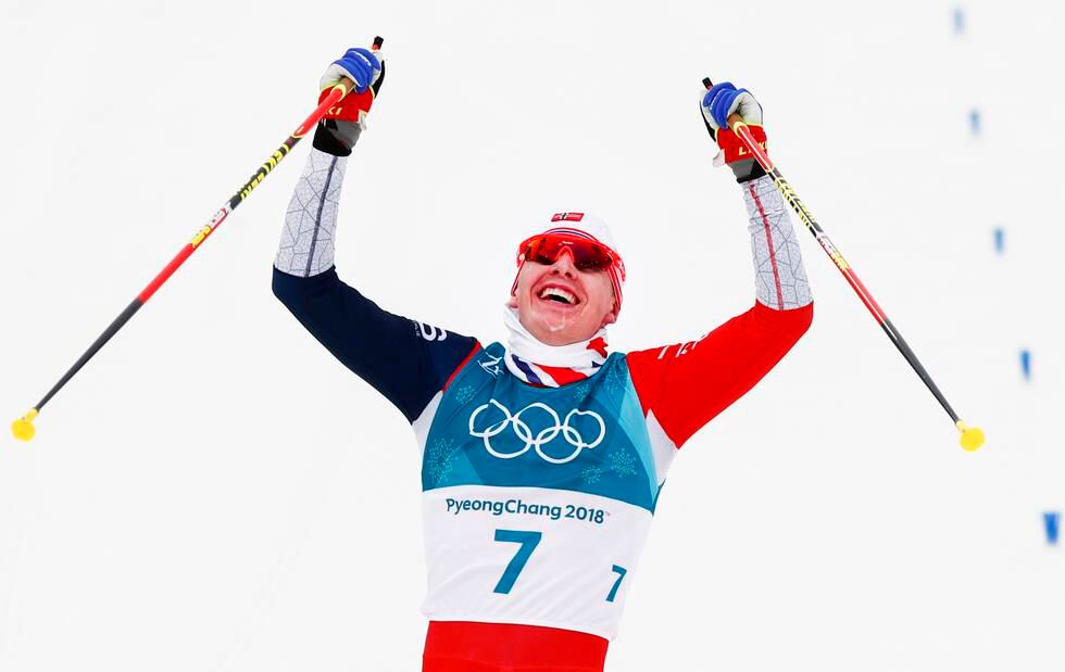 Simen Hegstad Krüger jubler for OL-seieren i skiathlon for fire år siden. Foto: Terje Pedersen / NTB