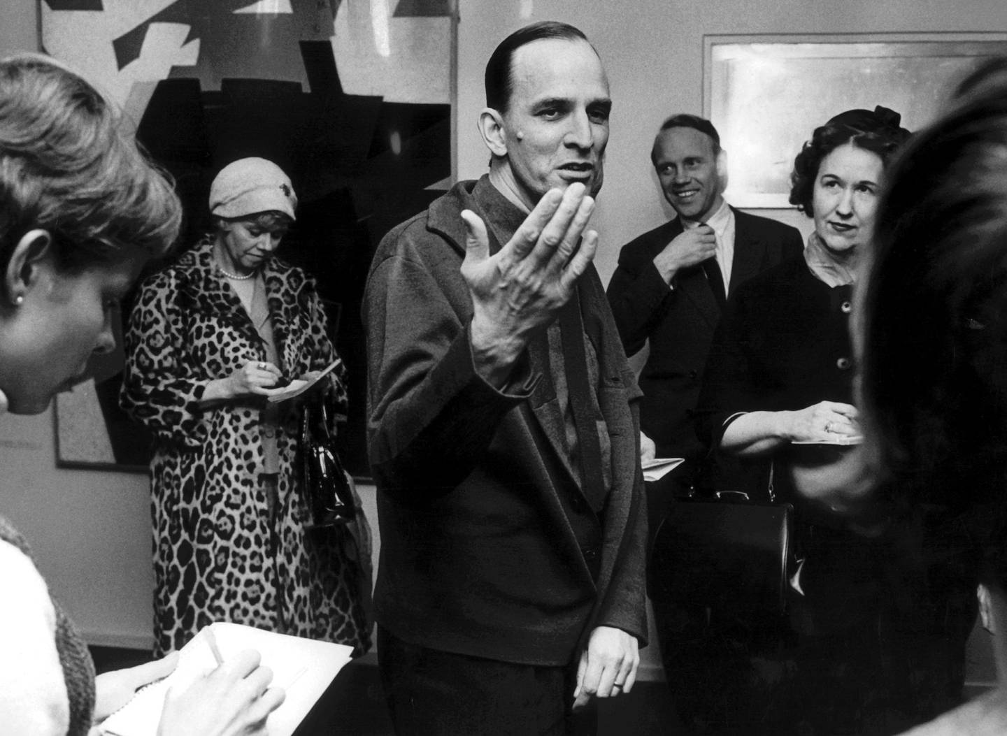 (FILES) This file photo taken on December 6, 1963 shows Swedish director Ingmar Bergman (C) showing to journalists new art works at The Royal Dramatic Theatre, Swedens National Theatre commonly known as Dramaten, in Stockholm.

Swedish film legend Ingmar Bergman, whose tales of anguished love and loneliness made him one of the 20th century's leading directors, is back in the spotlight with a series of events to mark the centenary of his birth. Bergman, who died in 2007 at the age of 89, would have turned 100 on July 14, 2018. / AFP PHOTO / TT NEWS AGENCY / -