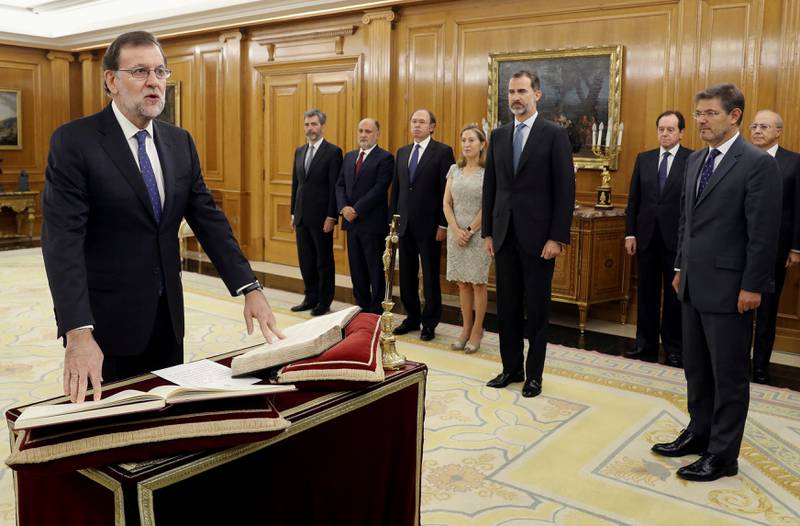 Mariano Rajoy ble tatt i ed som statsminister i går i en seremoni på slottet i Madrid.