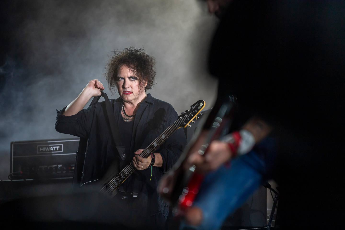 Singer of The Cure Robert Smith performs on the main stage, during the 44th edition of the Paleo Festival, in Nyon, Switzerland, Thursday, July 25, 2019. The Paleo is a open-air music festival in the western part of Switzerland that takes place from 23rd to 28th July. (Martial Trezzini/Keystone via AP)