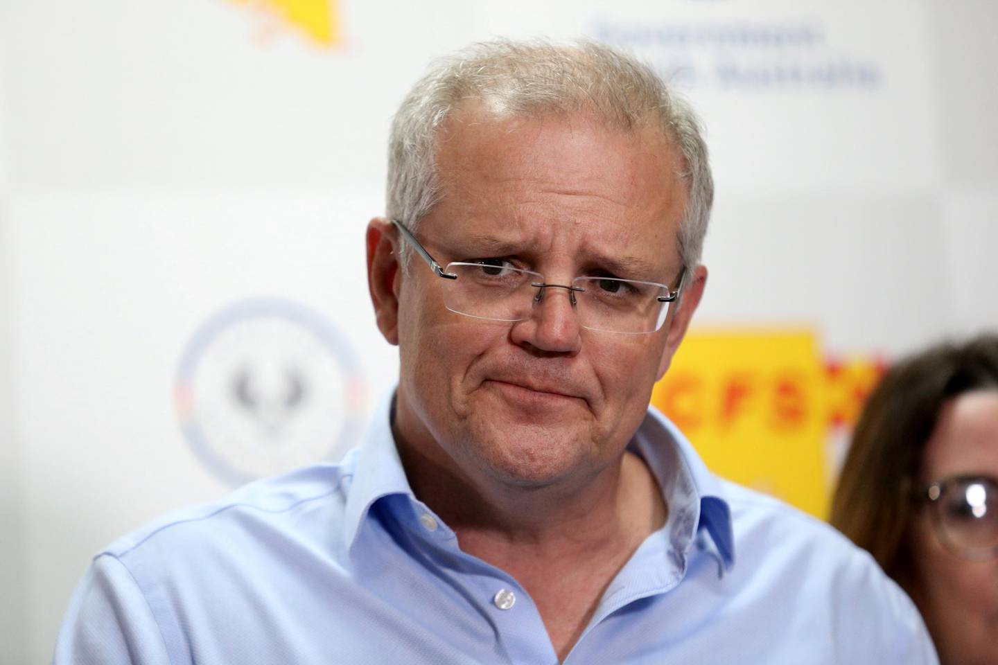 Australian Prime Minister Scott Morrison speaks to the media during a press conference at the Mt Barker CFS HQ in Mount Barker, Australia, December 24, 2019 while touring areas affected by the bushfires. AAP Image/Kelly Barnes via REUTERS ATTENTION EDITORS - THIS IMAGE HAS BEEN SUPPLIED BY A THIRD PARTY. NO RESALES. NO ARCHIVES. AUSTRALIA OUT. NEW ZEALAND OUT.
