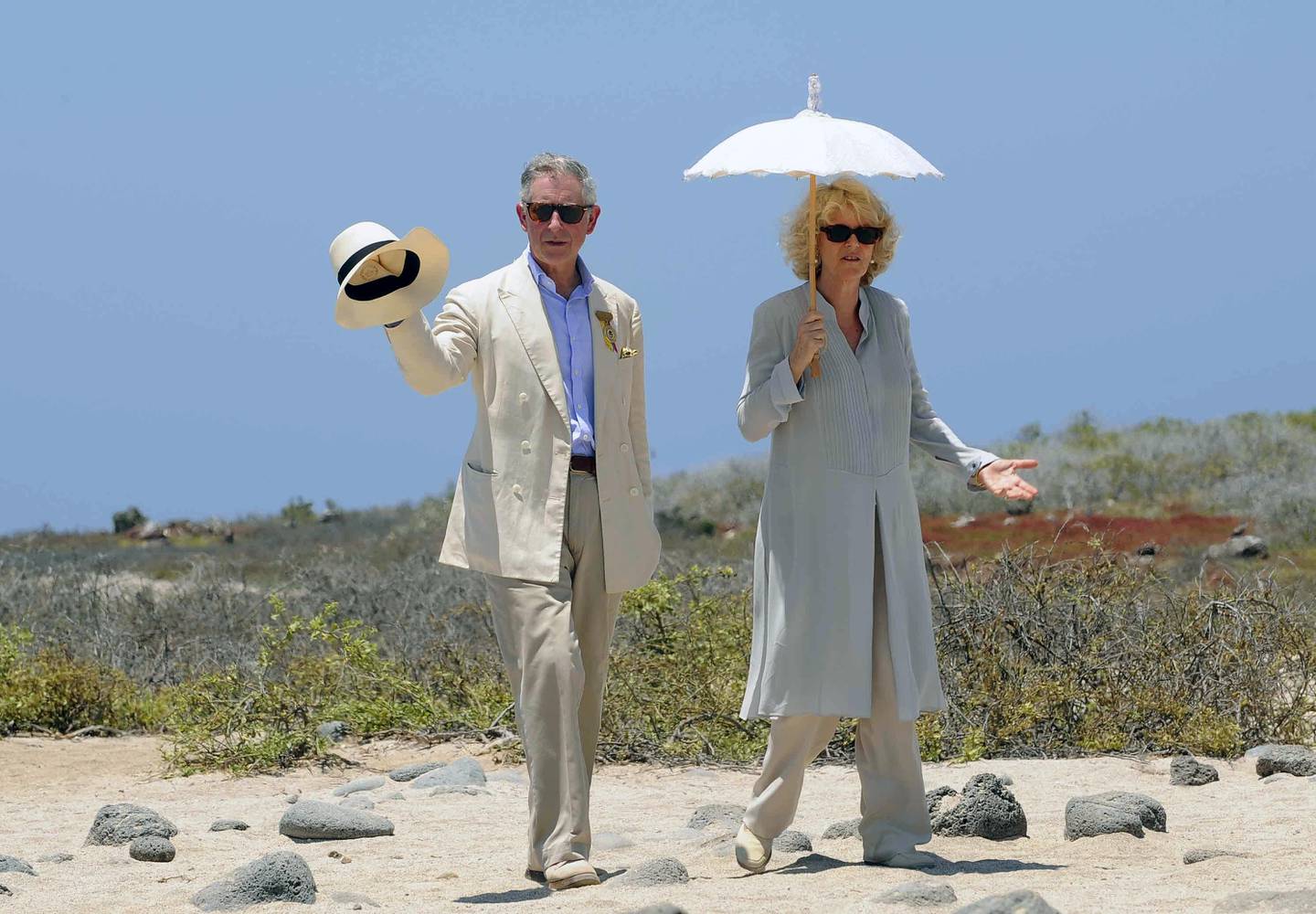 (FILES) In this file photo taken on March 17, 2009 Britain's Prince Charles (L) walks with his wife Camilla Parker Bowles, Duchess of Cornwall, during a visit to Seymour island on March 17, 2009. - Britain's Prince Charles turns 70 on November 14, 2018 as busy as ever, having spent a lifetime forging his own path during his record wait for the throne. (Photo by Rodrigo BUENDIA / AFP)