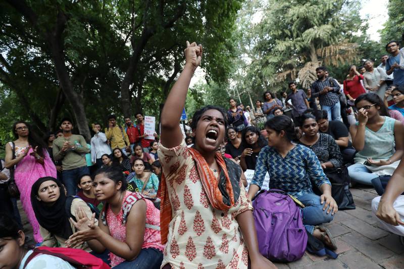 A student shouts slogans during a protest against the scrapping of the special constitutional status for Kashmir by the government, in New Delhi, India, August 8, 2019. REUTERS/Anushree Fadnavis
