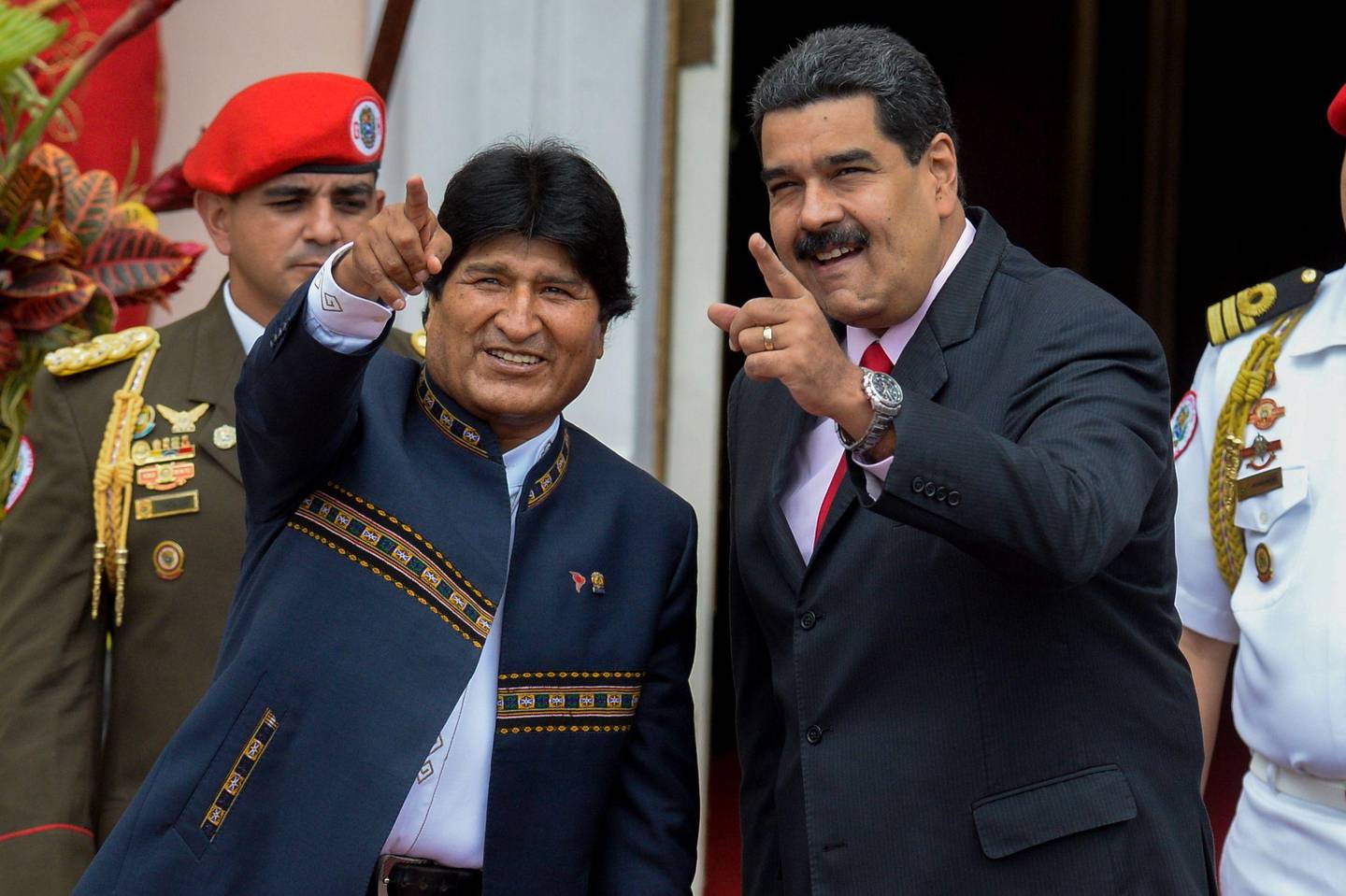 (FILES) In this file photo taken on March 5, 2017 Venezuelan President Nicolas Maduro (R) and Bolivian President Evo Morales gesture during the Bolivarian Alliance for the Peoples of Our America (ALBA) summit at the Miraflores presidential palace in Caracas. - Bolivian President Evo Morales resigned on November 10, 2019, caving in following three weeks of sometimes-violent protests over his disputed re-election after the army and police withdrew their backing. (Photo by Federico PARRA / AFP)