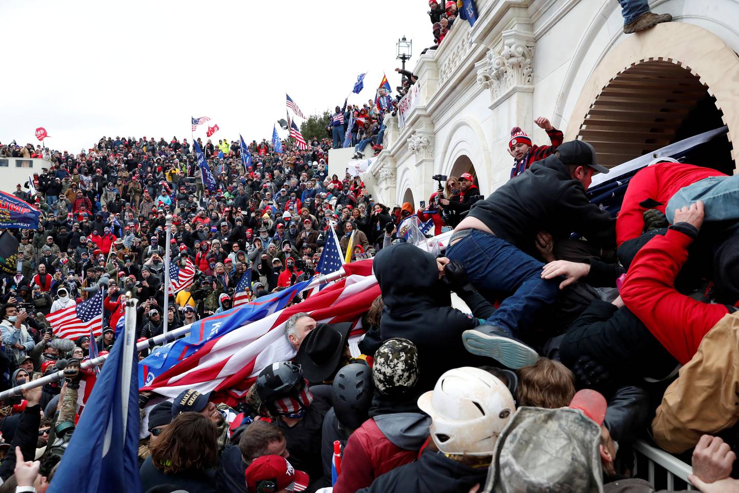 FILE PHOTO: Pro-Trump protesters storm into the U.S. Capitol during clashes with police, during a rally to contest the certification of the 2020 U.S. presidential election results by the U.S. Congress, in Washington, U.S, January 6, 2021. REUTERS/Shannon Stapleton - RC2P2L93TPZS/File Photo