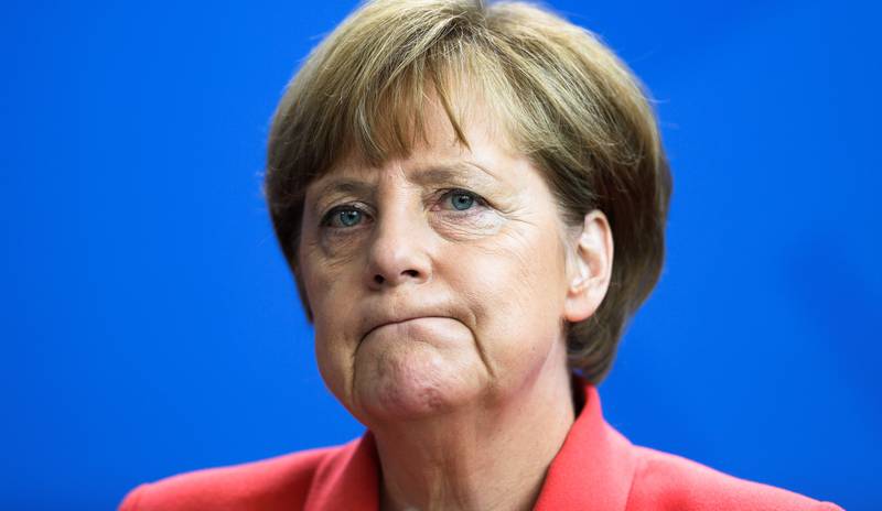 Tysklands forbundskansler Angela Merkel vil vente til etter folkeavstemningen for flere forhandlinger med Hellas. FOTO: NTB scanpix