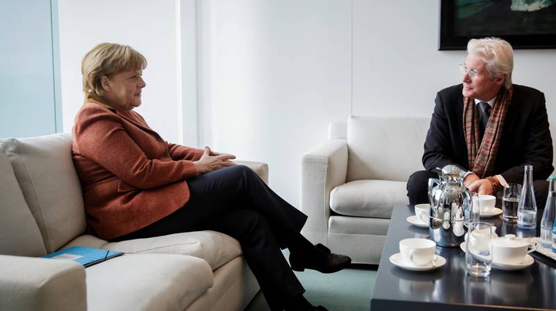 Richard Gere benyttet muligheten til å møte Angela Merkel for å snakke amerikansk politikk i Berlin.