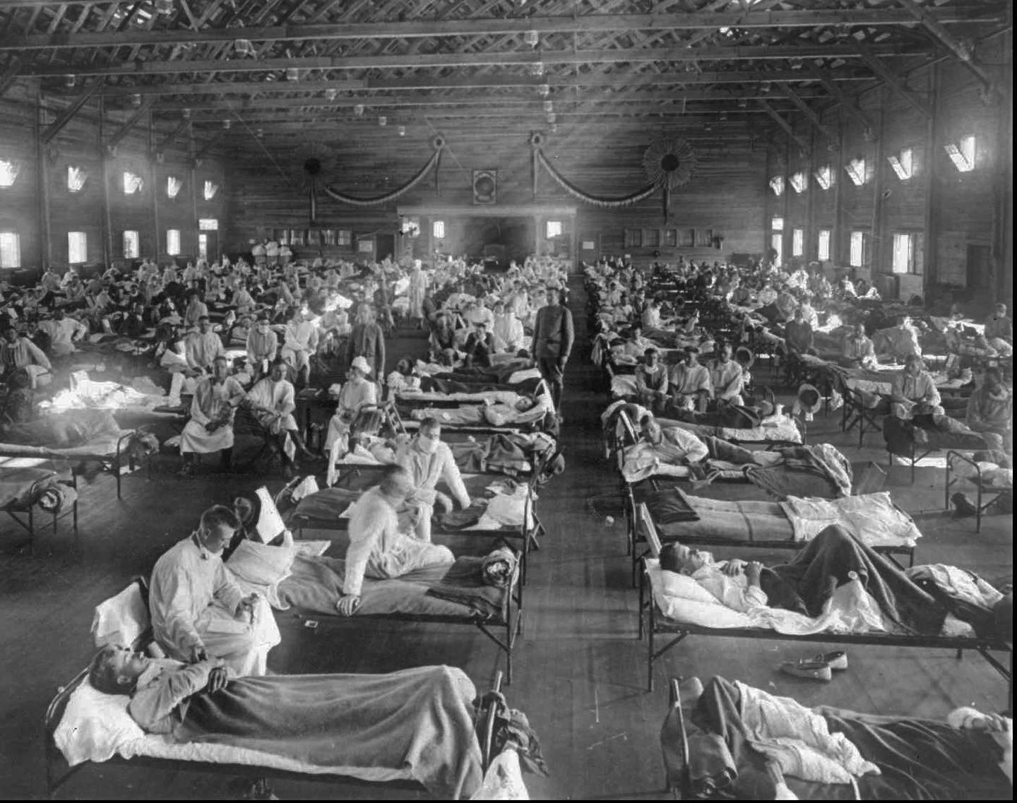 Influenza victims crowd into an emergency hospital near Fort Riley, Kansas in this 1918 file photo. The 1918 Spanish flu pandemic killed at least 20 million people worldwide and officials say that if the next pandemic resemblers the birdlike 1918 Spanish flu, to 1.9 million Americans could die. (AP Photo/National Museum of Health)