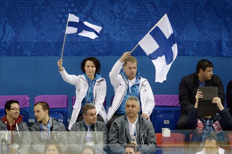 Sauli Niinistö vil holde muligheten åpen for NATO-medlemskap. Her med kona Jenni Haukio under OL i Sotsji. FOTO: NTB SCANPIX