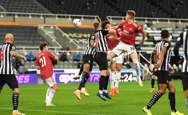 Manchester United's Harry Maguire scores their first goal during the English Premier League soccer match between Newcastle United and Manchester United at St. James' Park in Newcastle, England, Saturday, Oct. 17, 2020. (Stu Forster/Pool via AP)