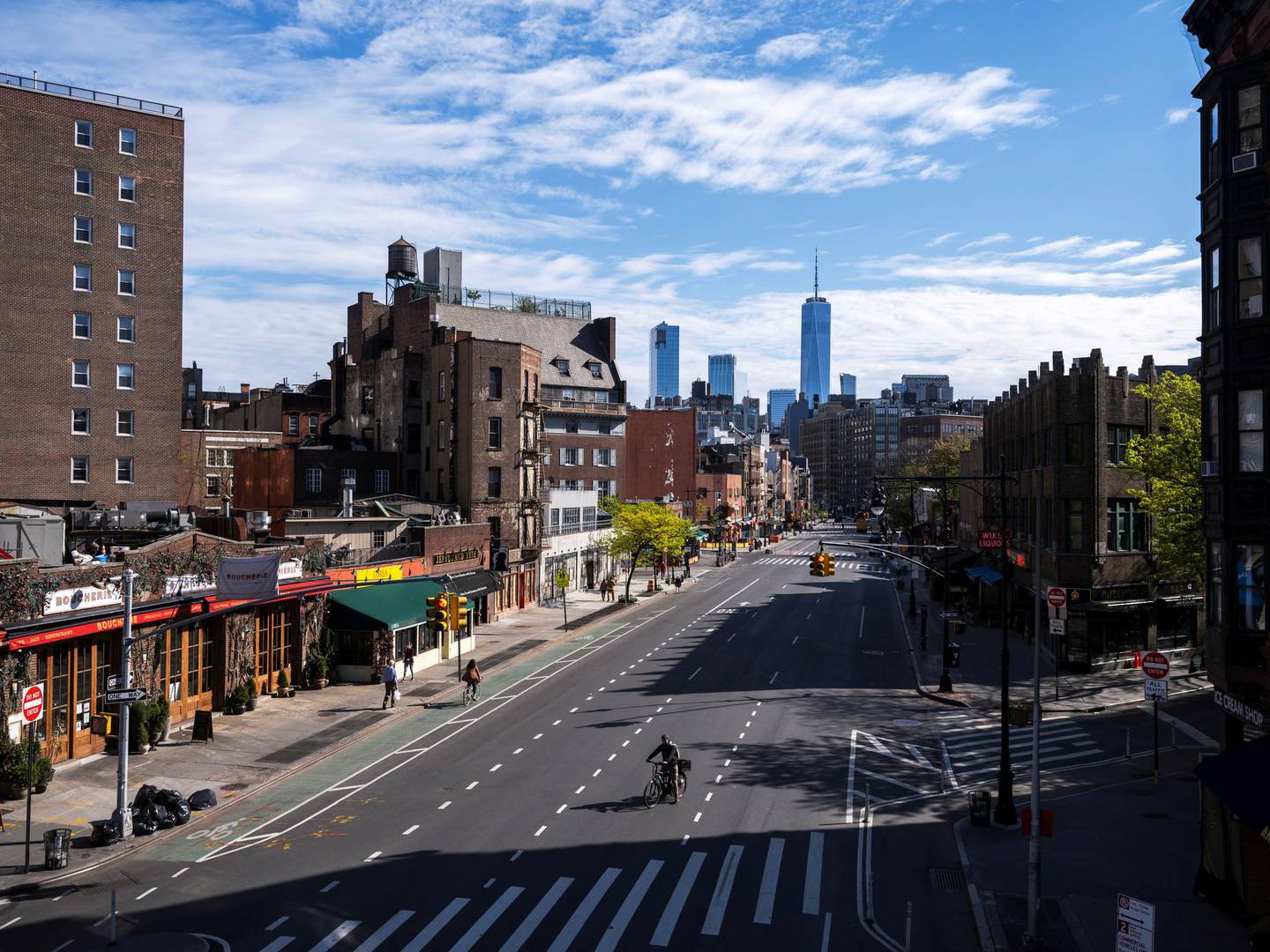 FILE PHOTO: A cyclist rides up 7th Avenue past the West Village neighborhood as streets remain less busy due to the continuing outbreak of the coronavirus disease (COVID-19) in the Manhattan borough of New York U.S., May 5, 2020. Picture taken May 5, 2020 at 4:48PM. REUTERS/Lucas Jackson/File Photo