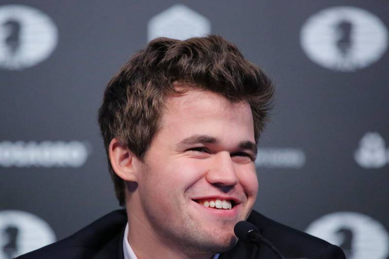Magnus Carlsen kunne glise bredt etter at hans tredje VM-tittel var i boks.