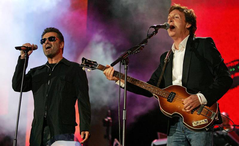 Paul McCartney og George Michael under Live 8-konserten i Hyde Park i London sommeren 2005. FOTO: NTB SCANPIX