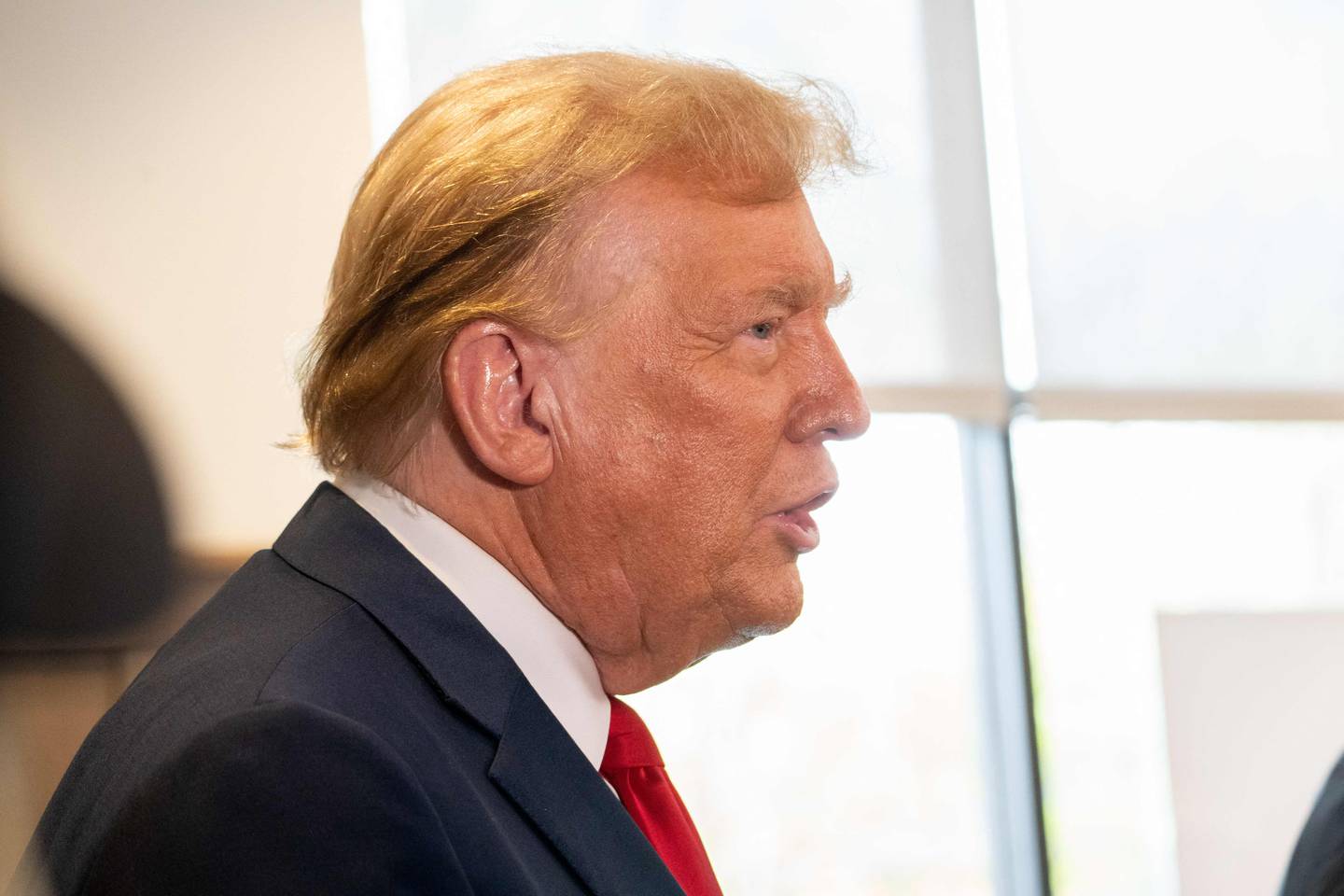 ATLANTA, GEORGIA - APRIL 10: Former U.S. President Donald Trump makes a visit to a Chick-fil-A restaurant on April 10, 2024 in Atlanta, Georgia. Trump is visiting Atlanta for a campaign fundraising event he is hosting.   Megan Varner/Getty Images/AFP (Photo by Megan Varner / GETTY IMAGES NORTH AMERICA / Getty Images via AFP)