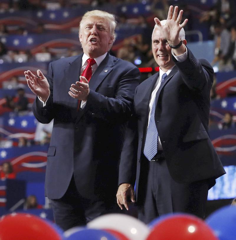 Republikanerne: Presidentka ndidat Donald Trump og visepresidentkandidat Mike Pence i et ballonghav på landsmøtets siste dag sist uke. FOTO: AARON P. BERNSTEIN/NTB SCANPIX