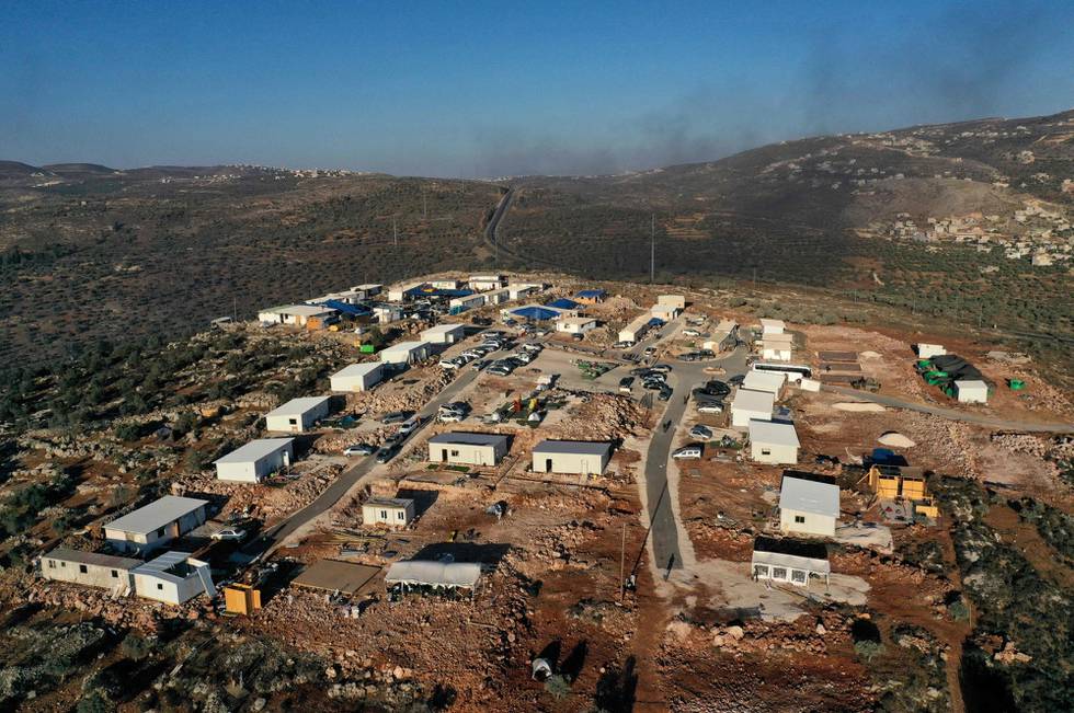 An aerial picture shows the newly-established wildcat outpost of Eviatar near the northern Palestinian city of Nablus in the occupied West Bank, on June 28, 2021. - Jewish settlers agreed to leave a new outpost in the occupied West Bank that has stirred weeks of Palestinian protests following a deal with Israel's government, in an agreement confirmed by the interior ministry and settler leaders, under which they will leave the Eviatar outpost within days but their mobile homes will remain and Israeli troops will establish a base in the area. (Photo by MENAHEM KAHANA / AFP)