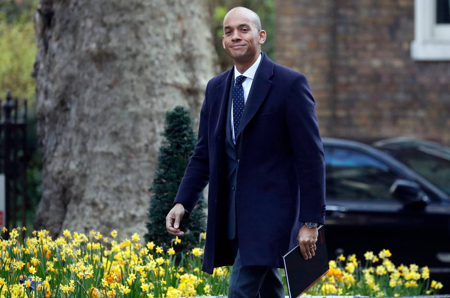 FILE - In this file photo dated Monday, April 1, 2019, Britain's lawmaker Chuka Umunna arrives at 10 Downing Street for a knife crime summit in London.  Umunna quit the Labour Party earlier this year to help form a pro-European new political party, but has now moved to join the centrist Liberal Democrats, and is quoted Friday June 14, 2019, in The Times of London, saying the Lib Dems are best placed to stop Brexit.(AP Photo/Frank Augstein, FILE)