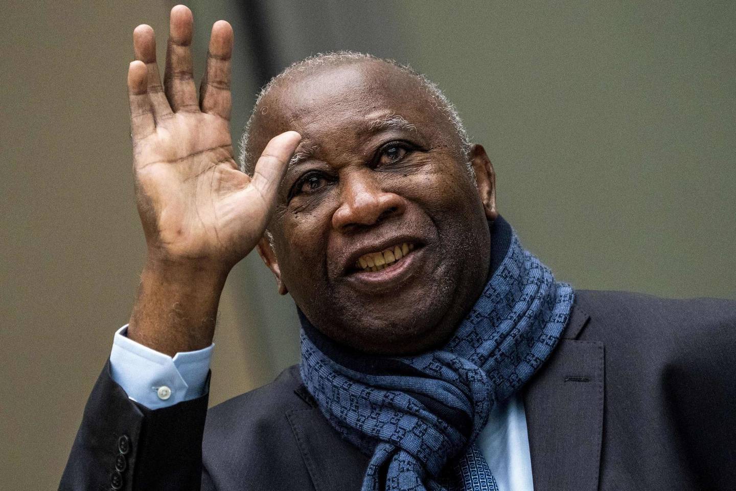 (FILES) In this file photo taken on February 6, 2020, former Ivory Coast President Laurent Gbagbo arrives at the courtroom prior to the opening of a hearing concerning his request for unconditional release at the Board of Appeal of the International Criminal Court (ICC), in The Hague. - Ivory Coast should allow former president Laurent Gbagbo, who has been barred from running in next month's key presidential election, to vote in the poll, the African Court on Human and Peoples' Rights said on September 25, 2020. The court, established by African Union members in 2004, asked Ivory Coast to "take all necessary steps to immediately remove all obstacles" preventing Gbagbo from being added to the electoral roll. Ivory Coast withdrew its recognition of the court's jurisdiction in April 2020. (Photo by Jerry LAMPEN / ANP / AFP) / Netherlands OUT
