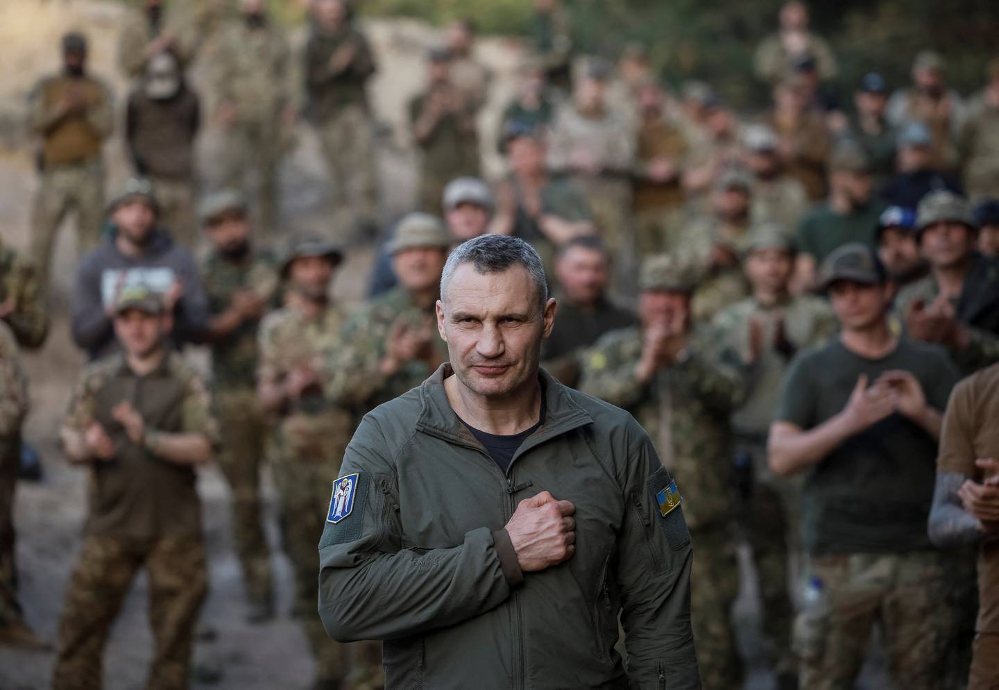 Kyiv Mayor Vitali Klitschko greets servicemen of the Svoboda (Freedom) battalion from the elite Storm Brigade "Rubizh" of the National Guard of Ukraine before an award ceremony for fighters, who have recently returned from the frontline in the Bakhmut area of Donetsk region, amid Russia's attack on Ukraine, in Kyiv region, Ukraine April 11, 2024. REUTERS/Gleb Garanich