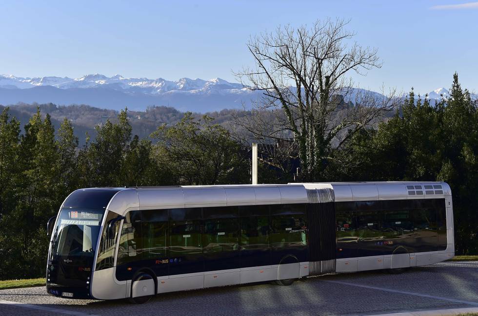 A picture taken on January 14, 2020 shows the new Febus hydrogen bus during its presentation at the Palais Beaumont in Pau. (Photo by GEORGES GOBET / AFP)