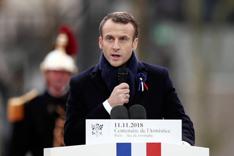 French President Emmanuel Macron delivers his speech as he attends a commemoration ceremony for Armistice Day, 100 years after the end of the First World War at the Arc de Triomphe in Paris, France, Sunday, November 11, 2018. (Benoit Tessier/Pool Photo via AP)