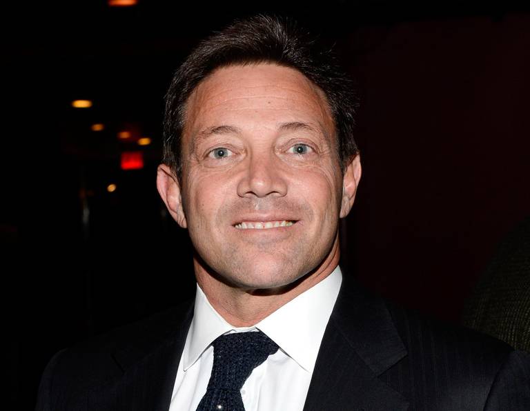 FILE - In this Tuesday, Dec. 17, 2013, file photo, Jordan Belfort attends the premiere party for "The Wolf of Wall Street" at the Roseland Ballroom in New York. On Wednesday, May 16, 2018, a federal judge in New York City said she wants to make sure real-life ?ÄúWolf of Wall Street?Äù Belfort continues to pay back the nearly $100 million he owes in restitution. Belfort has so far paid off about $13 million of an owed $110 million in restitution. (Photo by Evan Agostini/Invision/AP, File)