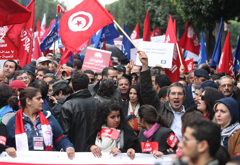 Her markerer tunisiere den arabiske revolusjonen som startet i Tunisia i 2013. FOTO: NRB SCANPIX 