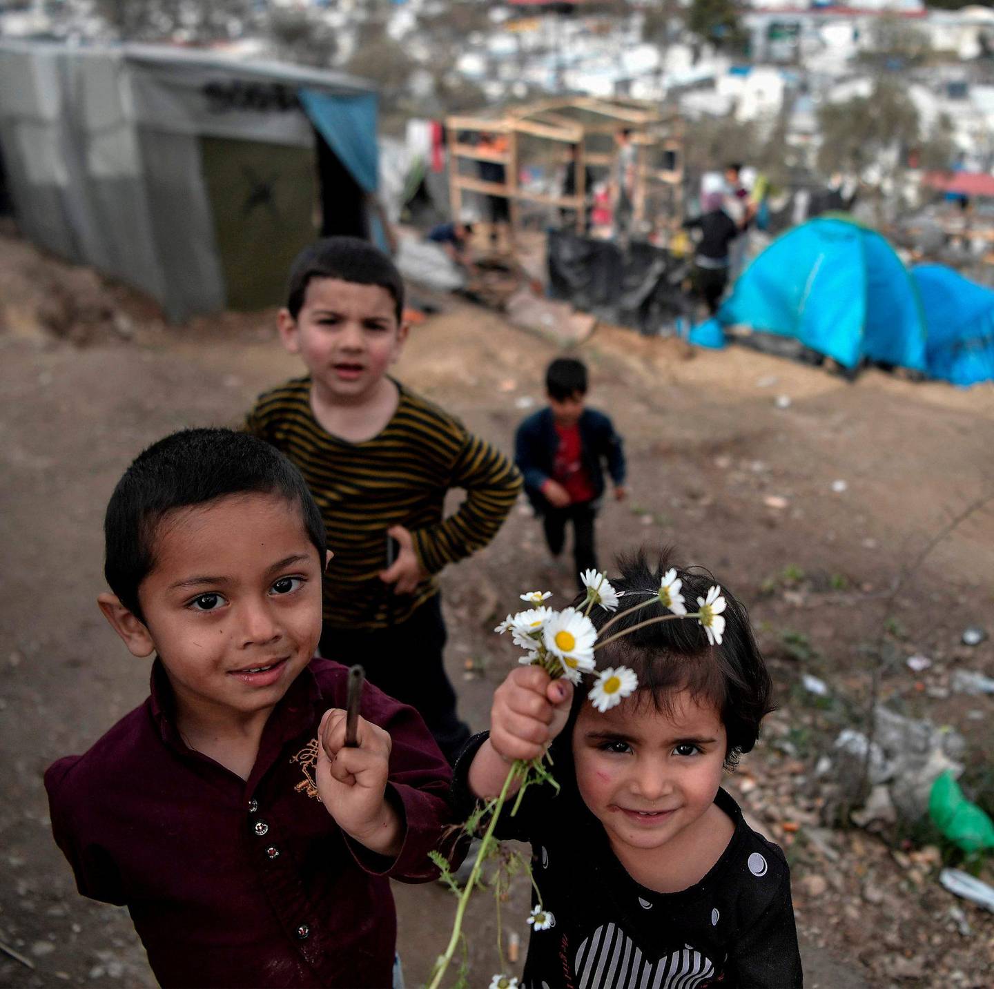 Flyktningbarn i den overbefolkede Moria-leiren på Lesvos, 7. mars i år. Foto: NTB scanpix