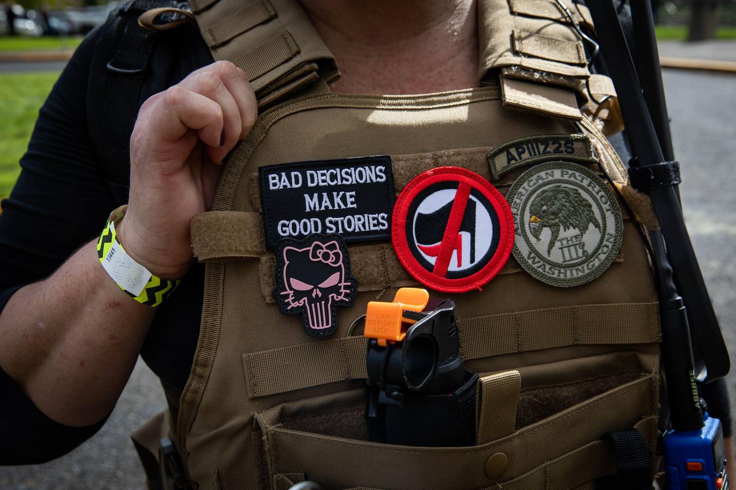 An attendee wears a "Three Percenter" patch during a Proud Boys rally at Delta Park in Portland, Oregon on September 26, 2020. - Far-right group "Proud Boys" members gather in Portland to show support to US president Donald Trump and to condemn violence that have been occurring for more than three months during "Black Lives Matter" and "Antifa" protests. (Photo by Maranie R. STAAB / AFP)