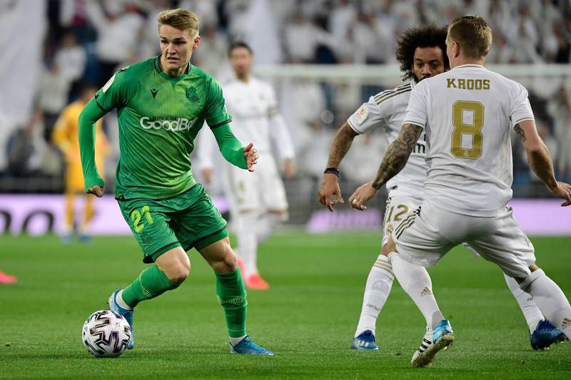 Real Sociedad's Norwegian midfielder Martin Odegaard controls the ball during the Spanish Copa del Rey (King's Cup) quarter-final football match Real Madrid CF against Real Sociedad at the Santiago Bernabeu stadium in Madrid on February 06, 2020. (Photo by JAVIER SORIANO / AFP)