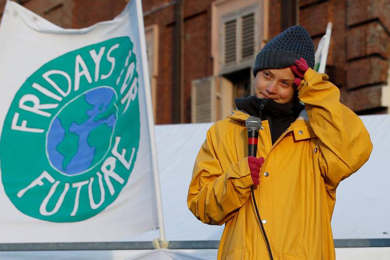 Swedish environmental activist Greta Thunberg attends a climate march, in Turin, Italy, Friday. Dec. 13, 2019. Thunberg was named this week Time's Person of the Year, despite becoming the figurehead of a global youth movement pressing governments for faster action on climate change. in Turin, Italy, Friday, Dec. 13, 2019. (AP Photo/Antonio Calanni)