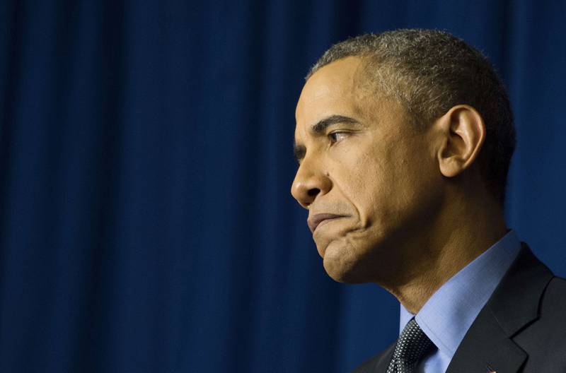 Barack Obama har akkurat kommet hjem fra klimatoppmøtet. Nå må han på nytt uttale seg om en skytetragedie. FOTO: NTB SCANPIX