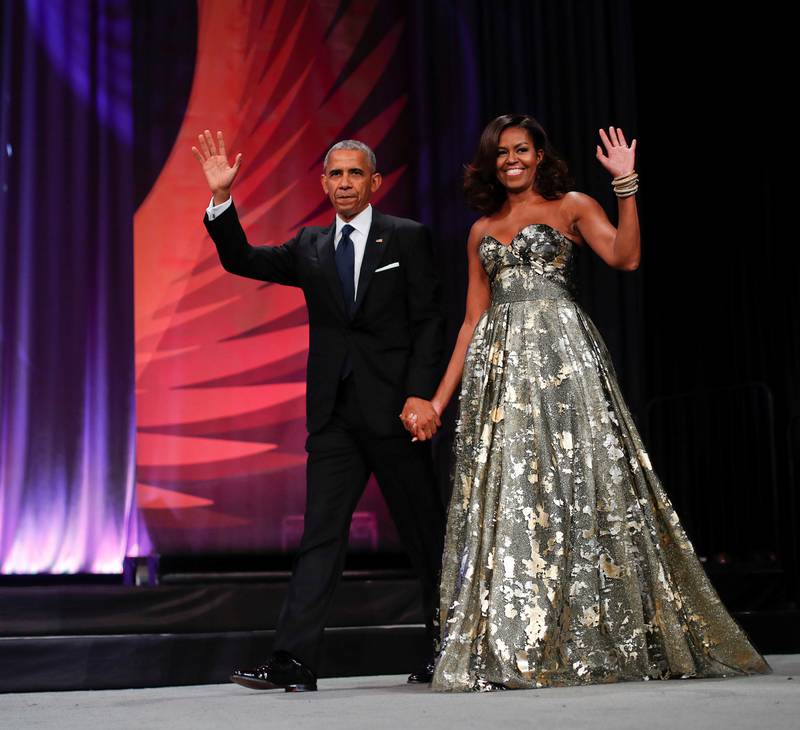 Michelle Obama er blitt et moteikon i løpet av de åtte årene som førstedame. Her med ektemannen Barack på en galla i Washington DC.