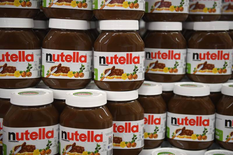 This photo taken on January 30, 2018 in Saint-Gregoire, near Rennes, northwest France, shows containers of Nutella. 
An independant organisation of the French economic ministry will launch an investigation on the recent 70%-off promotion of the Nutella spread, which sparked melees and brawls in several French supermarkets, learned on January 30.  / AFP PHOTO / DAMIEN MEYER