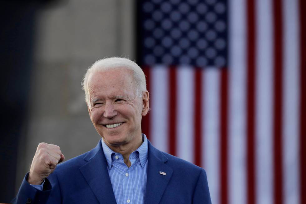 Democratic presidential candidate, former Vice President Joe Biden knowledges the crowd during a campaign rally Saturday, March 7, 2020, in Kansas City, Mo. (AP Photo/Charlie Riedel)